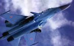 Ce Su-32 FN rentre son train d'atterrissage, notez les trois plans (canard, aile, velons)